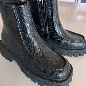 Black chunky ankle platform.